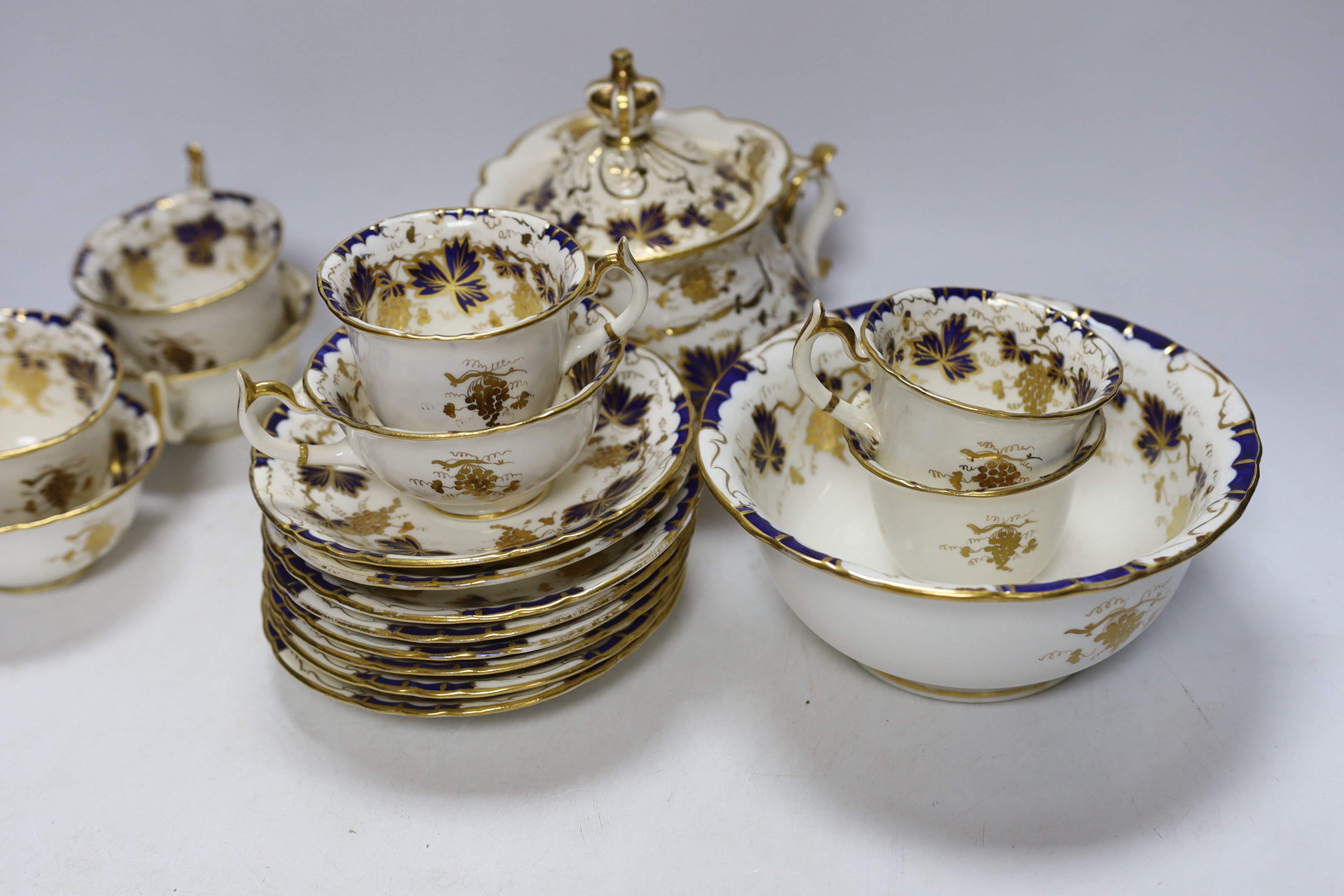 A mid 19th century Ridgeway style blue and gilt vine pattern twenty six piece part tea set